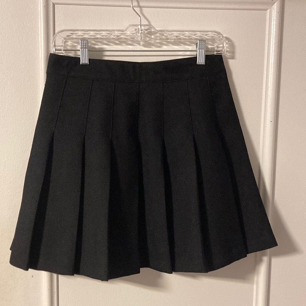 Black, pleated miniskirt